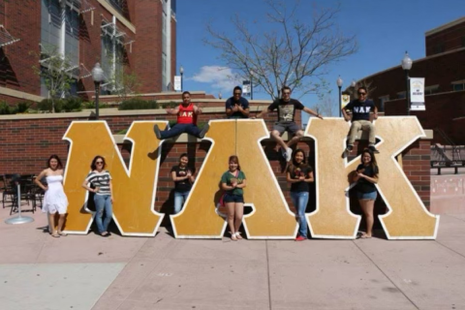 Brothers on the gold NAK letters